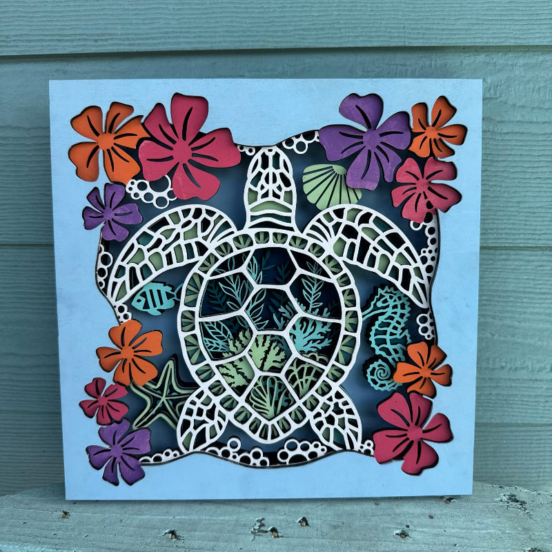 Colorful turtle and floral design on a blue background