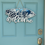 welcome surfboard with turtle sign