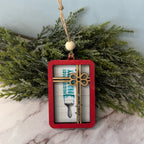 Decorative ornament with a key design on a branch