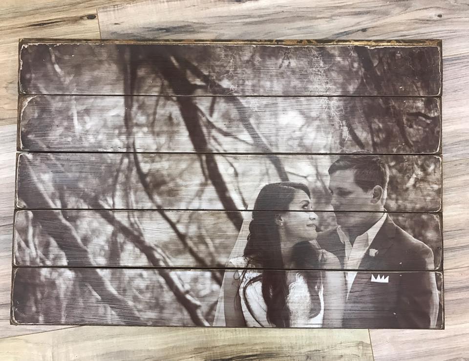 Sepia bride and groom photo on a five plank antiqued wood photo pallet