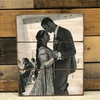 Black and white wedding first dance photo on a three plank wood photo pallet