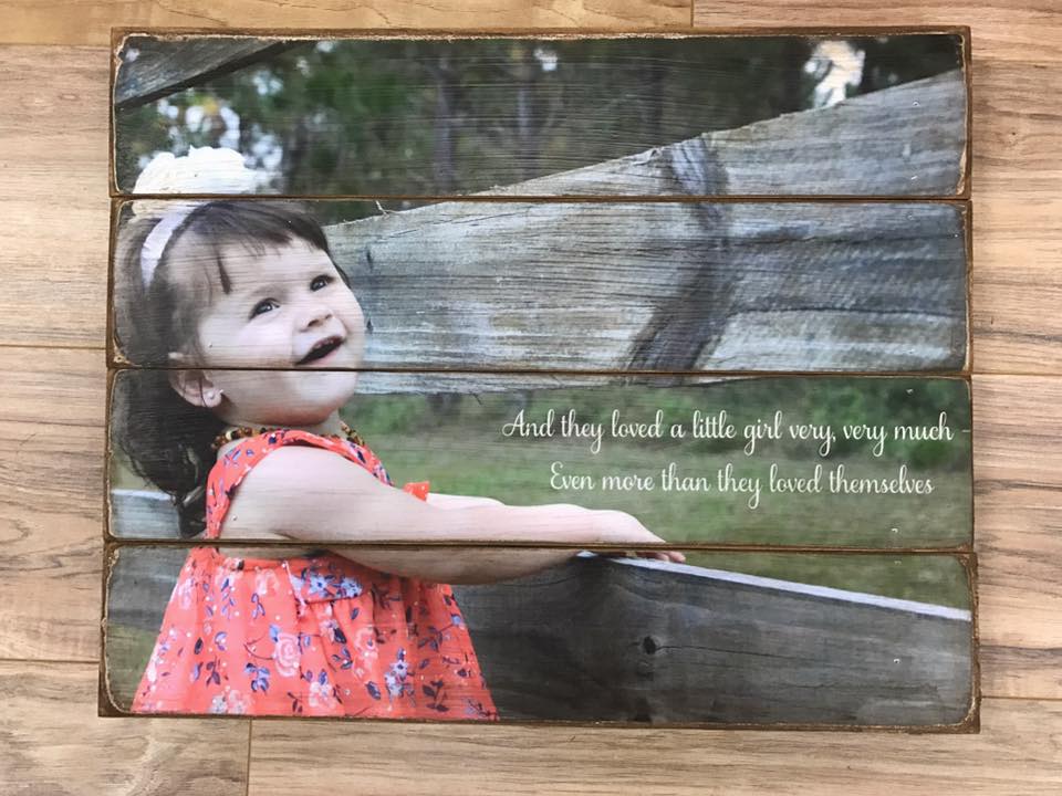 Baby girl portrait with a quote added, printed on a four plank wood photo pallet