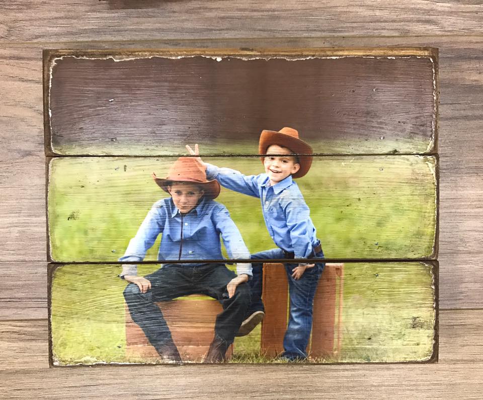 Two brothers in cowboy hats photo on a three plank wood photo pallet